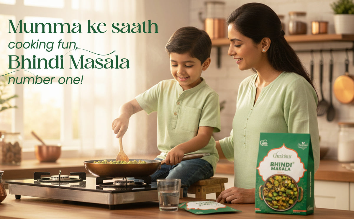 Woman and child cooking Bhindi Masala in a kitchen with a box of the product.