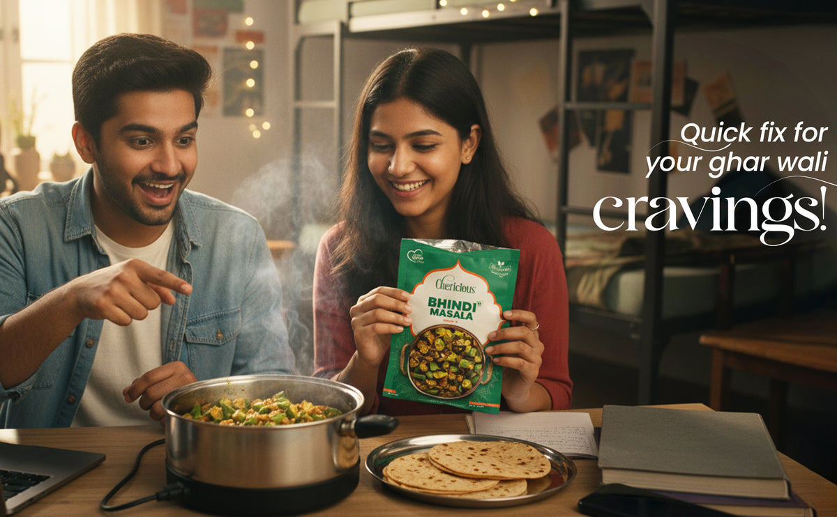Man and woman in a kitchen with a bag of snacks and food on a table.