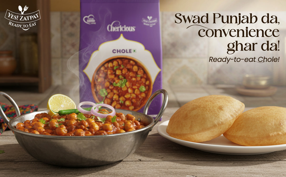 Chole (chickpea stew) with naan bread and a Crompton Chole packaging on a wooden table.