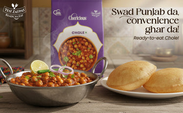 Chole (chickpea stew) with naan bread and a Crompton Chole packaging on a wooden table.