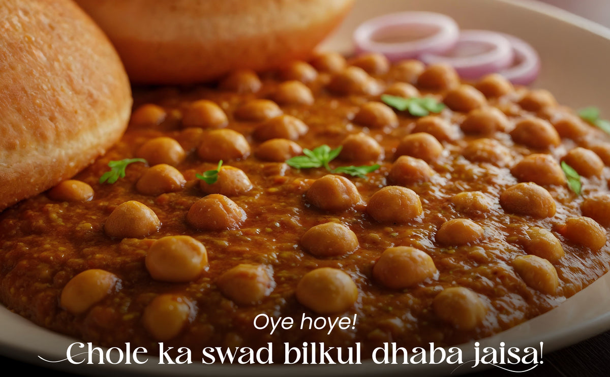 Chole (chickpea curry) with a bun and onions on a plate, with text overlay.