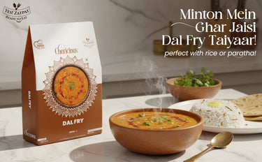 Cherishus Dalfry package with a bowl of dalfry, rice, and naan on a table.