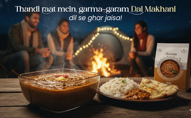 People sitting around a fire with food on a table, featuring a Chakriyas product.