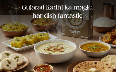 Gujarati Kadhi dish with various food items on a table, featuring a box of Gujarati Kadhi.