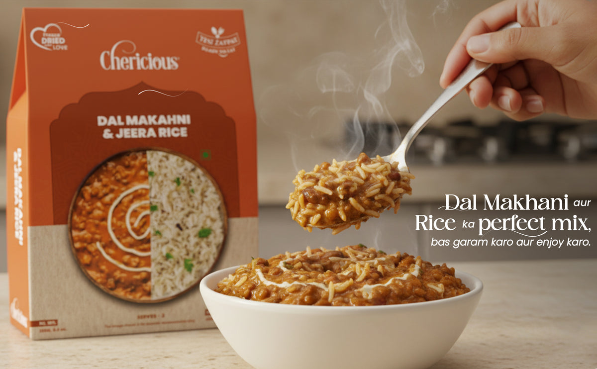 Dal Makhan & Jeera Rice packaging with a bowl of rice and a hand holding a spoon.