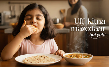 Child eating food with a bowl of soup and flatbread on a table, with text overlay.