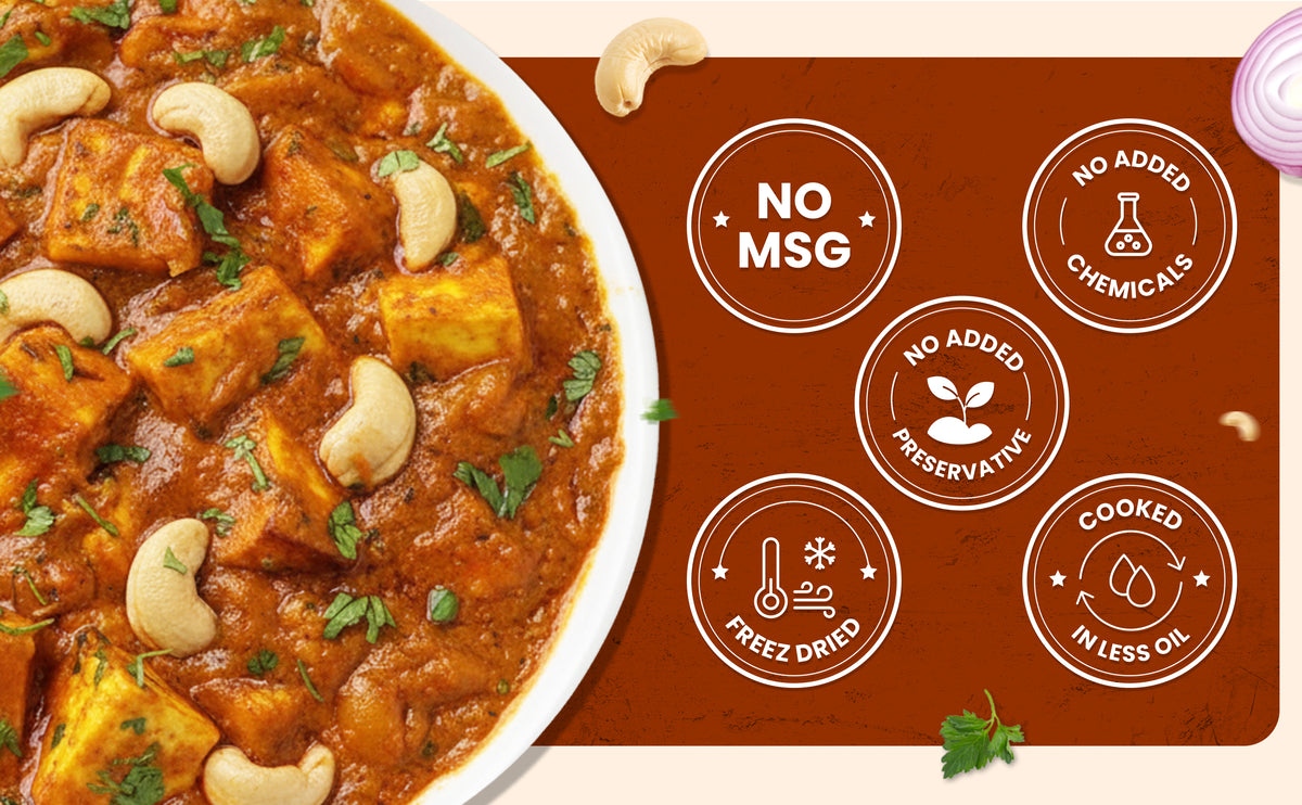 Dish of curry with cashews on a brown background with health claims