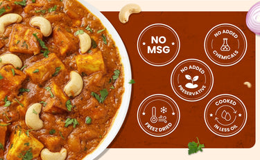 Dish of curry with cashews on a brown background with health claims