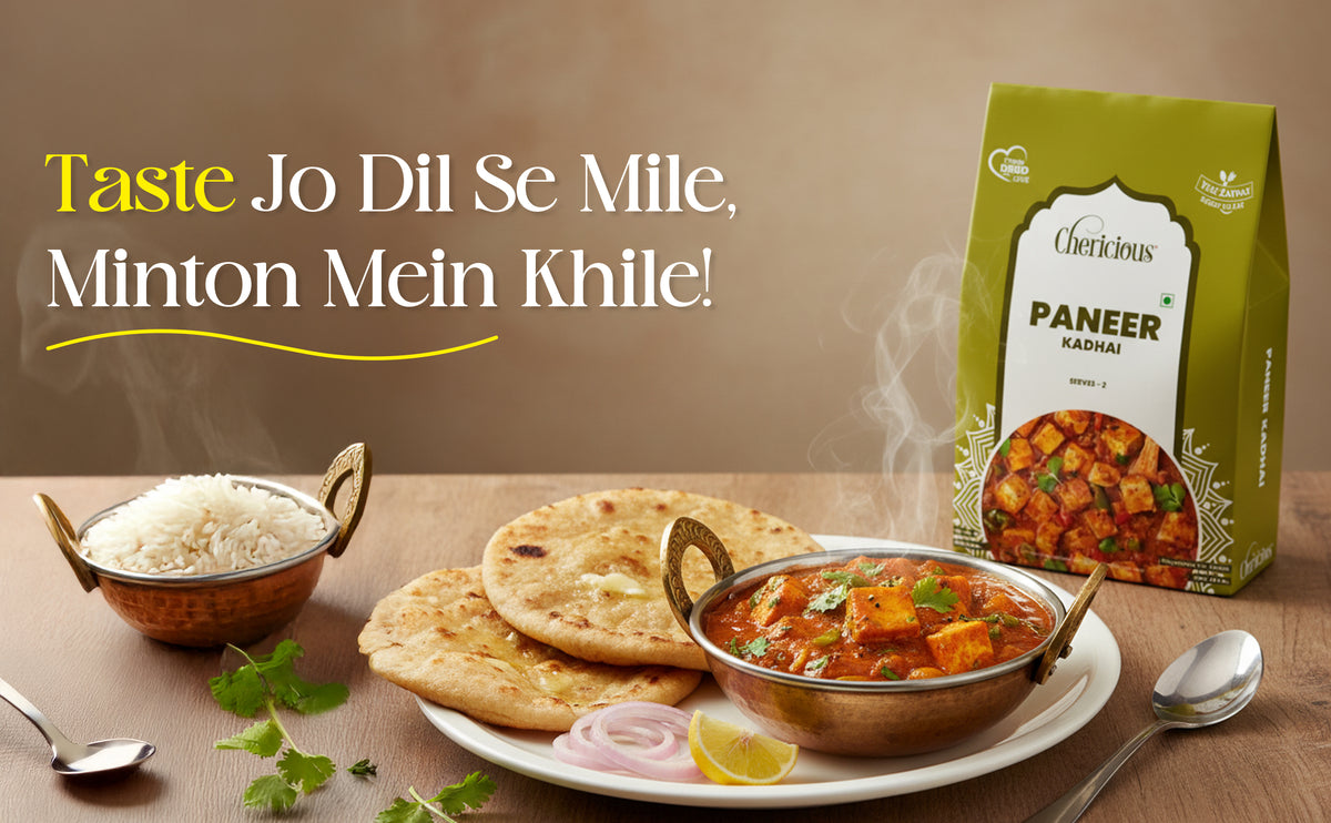 Dish of paneer with naan bread and rice, accompanied by a Cheekhoutis Paneer Kadhai packaging.