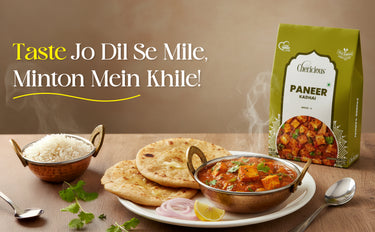 Dish of paneer with naan bread and rice, accompanied by a Cheekhoutis Paneer Kadhai packaging.