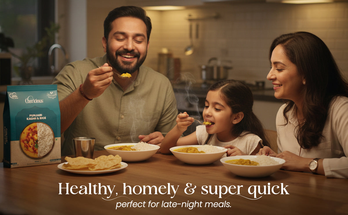Family enjoying a meal together with a box of Clarion pasta in the kitchen.