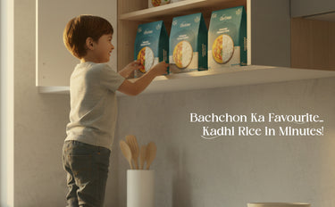 Child reaching for a package of 'Bachchon Ka Favourite Kadhi Rice' on a kitchen shelf.