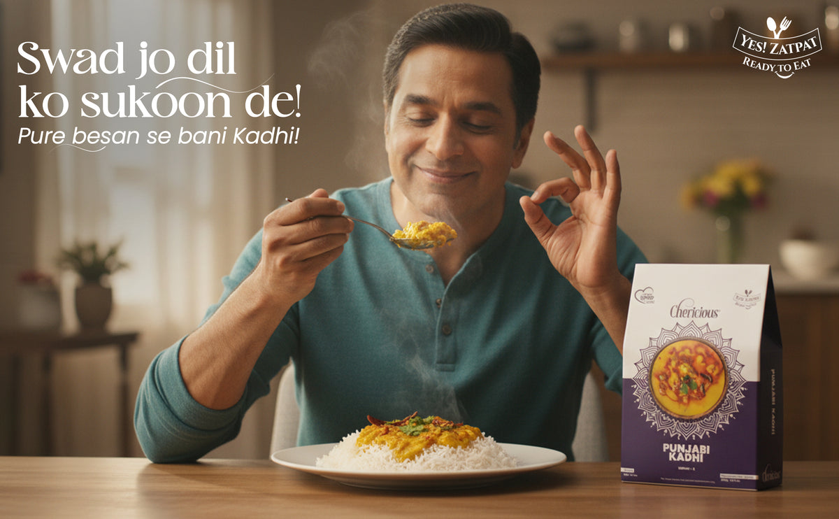 Man eating food with a box of 'Curious' brand product on a table
