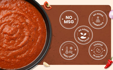 Red sauce in a pan with a label indicating no MSG, no added chemicals, and other health benefits on a brown background.