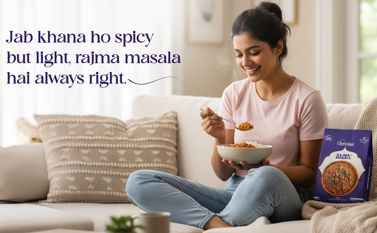 Woman eating Rajma Masala with a box of it on a couch