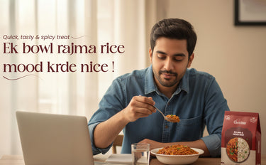 Man eating a bowl of food with a laptop on a table, with text about Rajma rice.