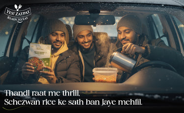 Three men in a car enjoying food from YES ZAPFAT, with text in Hindi.