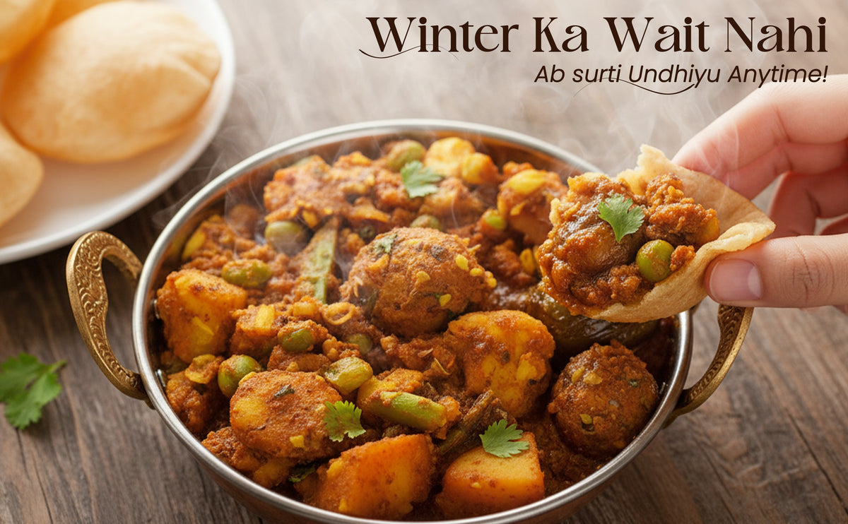 Bowl of curry with a hand dipping a chip into it, with text 'Winter Ka Wait Nahi Ab surti Undhiyu Anytime!' on a wooden surface.