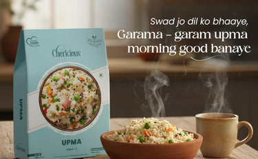 Cherlicious UPMA packaging with a bowl of upma and a cup on a wooden table.