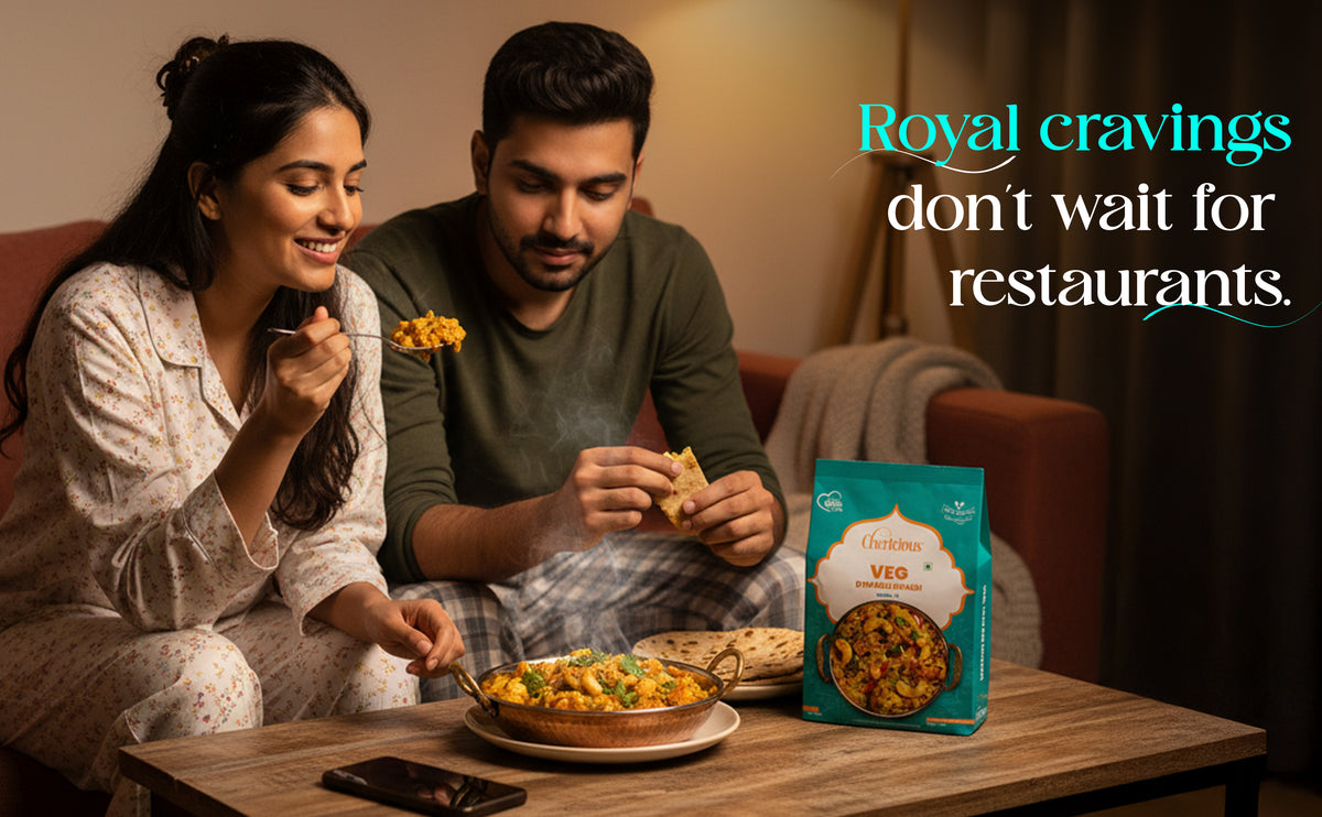 Man and woman enjoying a meal together with a 'Royal cravings' product in the foreground.