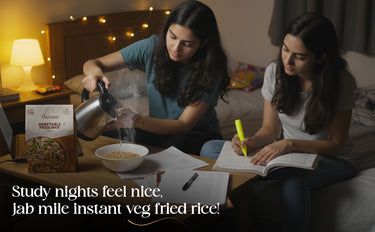 Two people studying together with instant fried rice on a table in a cozy room.