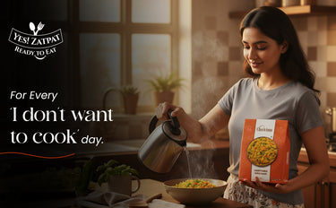 Woman preparing a meal with a box of ready-to-eat food in a kitchen.