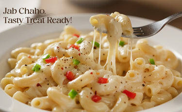 Macaroni and cheese with a fork lifting a portion, text 'Jab Chaho. Tasty Treat Ready!' above.