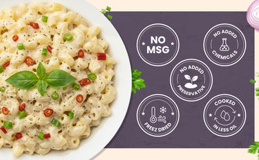 Macaroni and cheese with vegetables on a plate, featuring 'No MSG' and other health claims on a purple background.