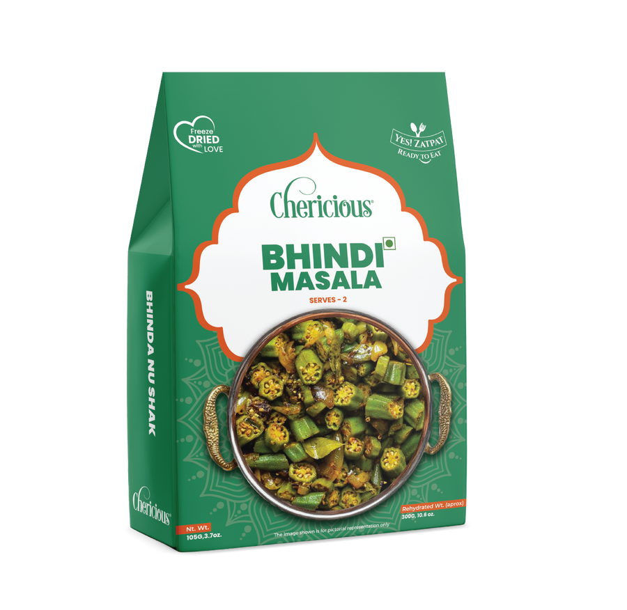 Green package of Chericious Bhindi Masala with a bowl of okra on a white background