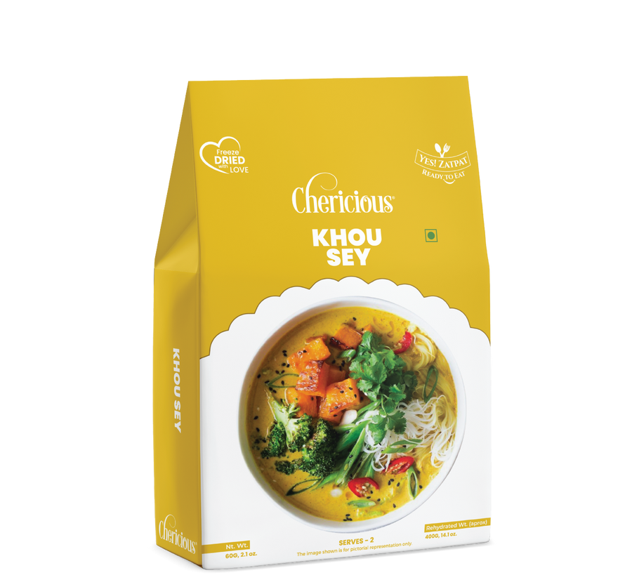 Yellow package of Cherlicious Khou Sey with a bowl of food on a white background