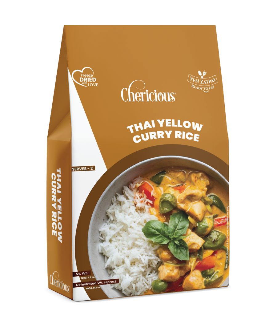 Packaging of Cherlicious Thai Yellow Curry Rice on a white background